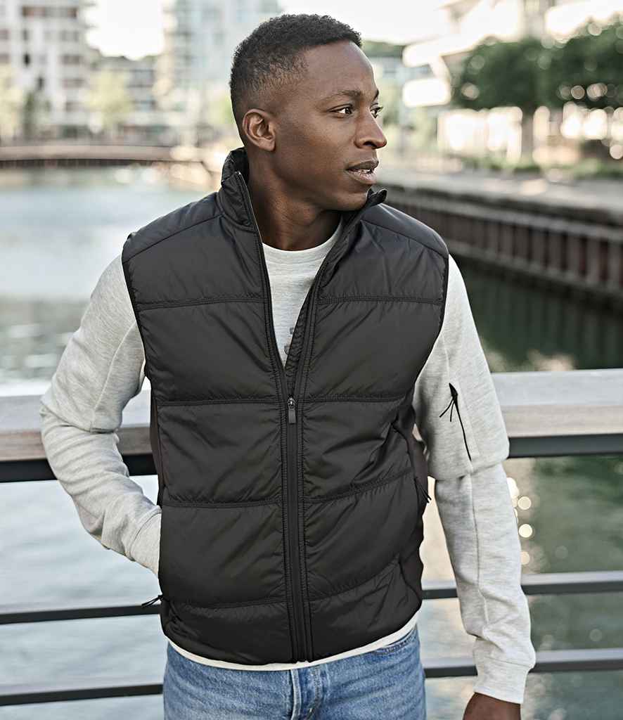 Tee Jays Tee Jays Hybrid-Stretch Bodywarmer Deep Green/Black